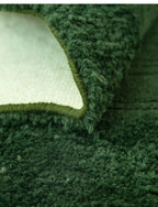 Grüner Hochflor Teppich